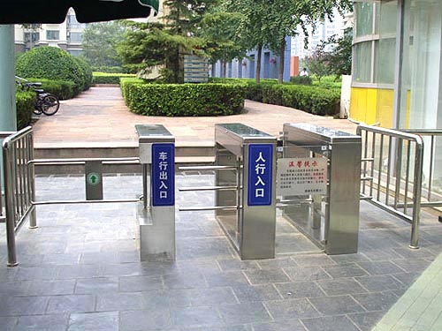 Half height turnstiles and swing gate